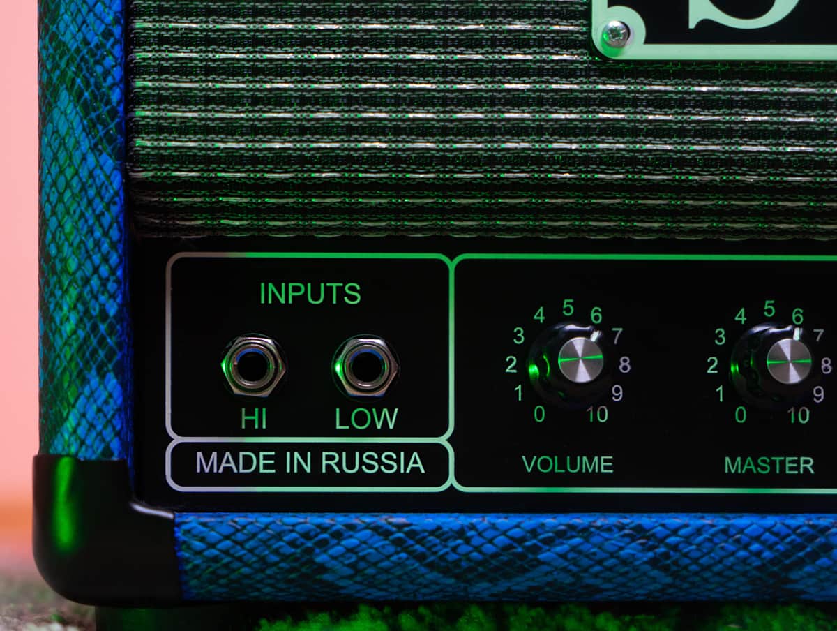 An amplifier control panel with volume and master controls