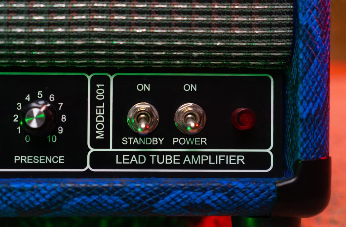 A valve combo amplifier with glowing tubes visible